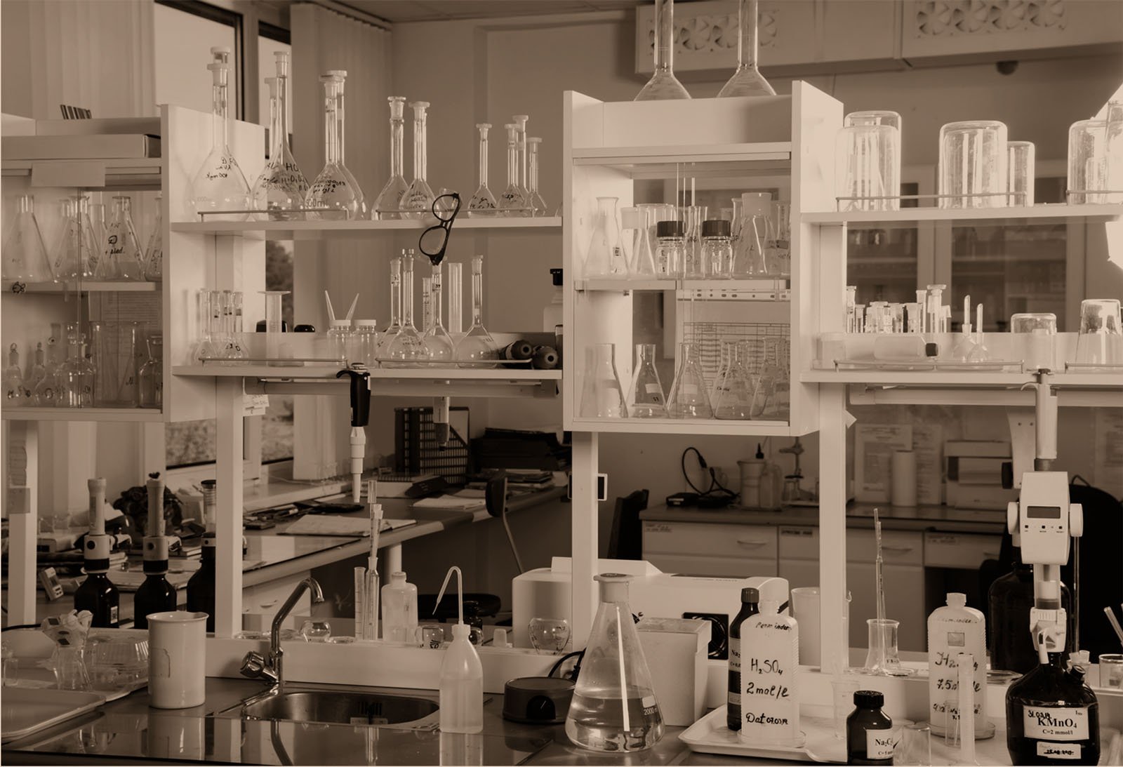 lab with shelves full of chemistry equipment