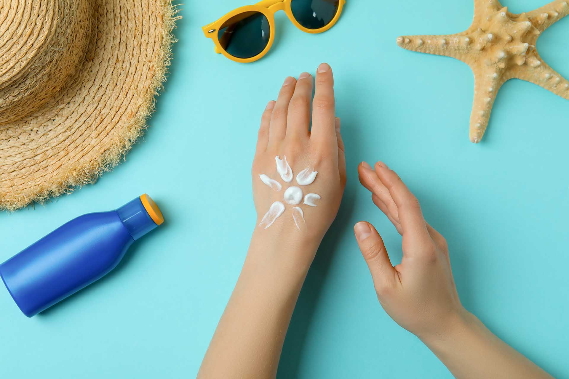 sunscreen on a persons hand