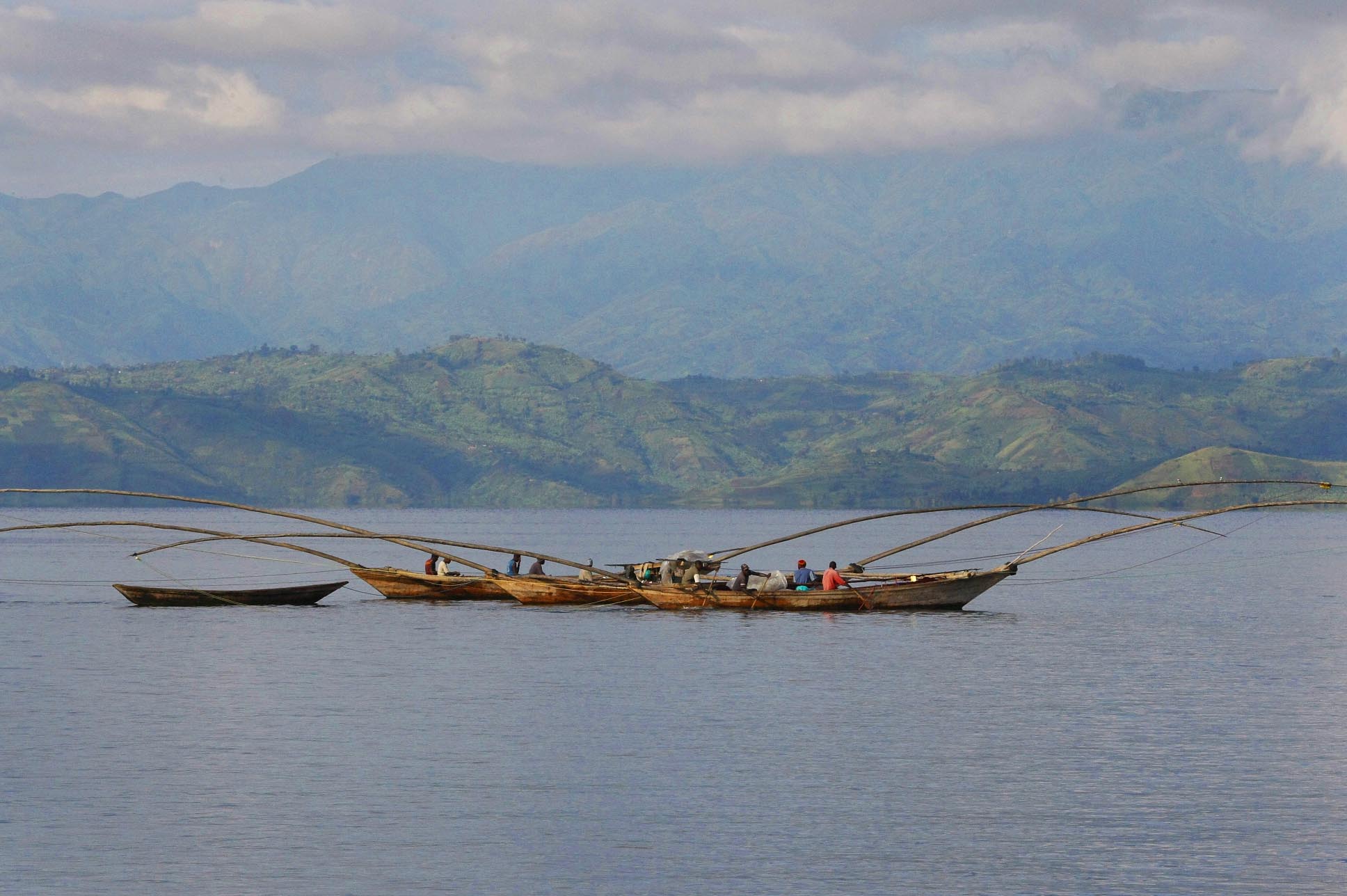 men fishing in Africa on lake Kivu