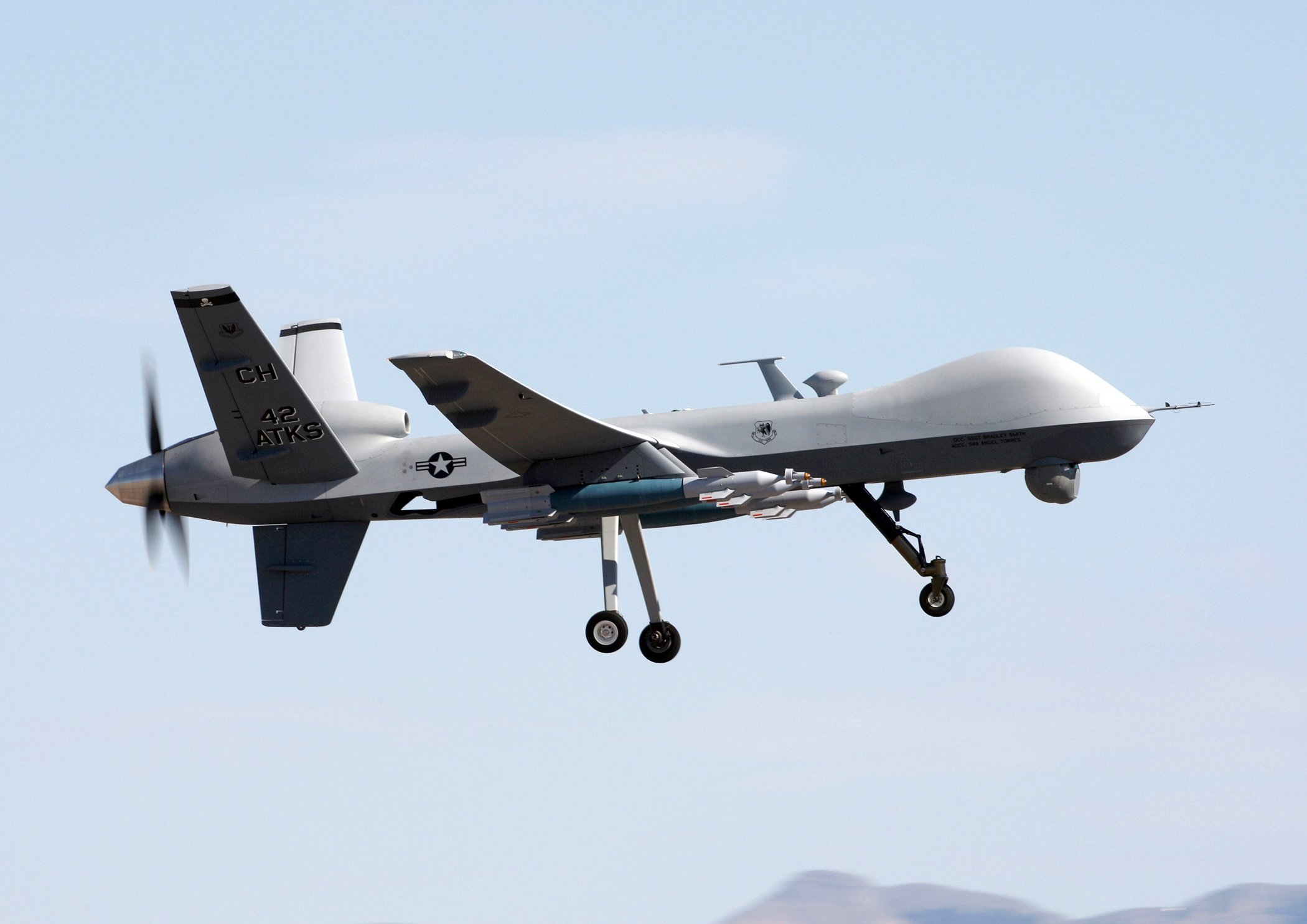 military unmanned combat aerial vehicle in the sky