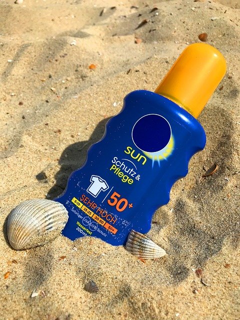 Noah Chemicals is your single source for both traditional and custom chemical products. bottle of sunscreen laying in the sand with seashells on it